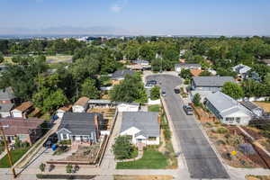 Aerial perspective of suburban area featuring a mountain backdrop