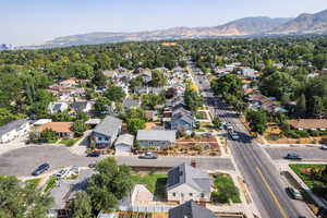 Aerial view of residential area featuring a mountain backdrop