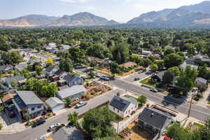 Aerial view of residential area featuring a mountainous background