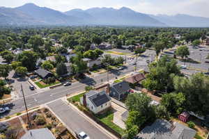 Aerial view of residential area featuring a mountain backdrop
