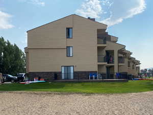 View of Condominium from the Beach.   (Condominium includes Second & Third Level)
