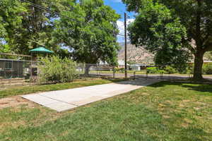 View of yard featuring a gate