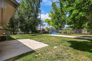 View of yard with a patio