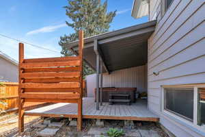 Wooden deck with a hot tub
