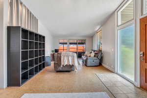 Living area featuring a textured ceiling
