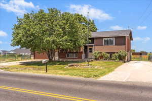 View of front of home featuring driveway