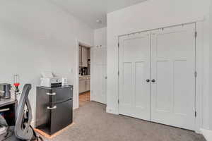 Office space with light colored carpet