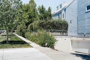 View of patio / terrace featuring an attached garage