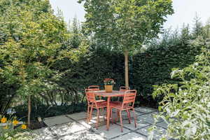 View of patio with outdoor dining area
