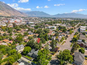 Aerial view of residential area featuring a mountain backdrop