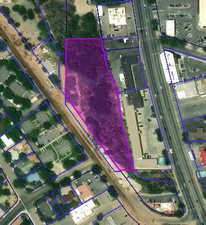 Aerial map of property and surrounding area with property boundaries highlighted