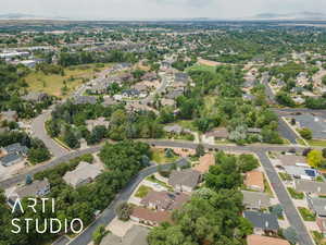 Aerial view of property's location featuring nearby suburban area