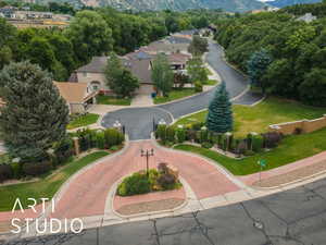 Aerial perspective of suburban area with a mountain backdrop