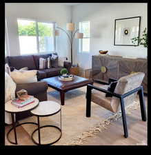 Living room featuring wood finished floors
