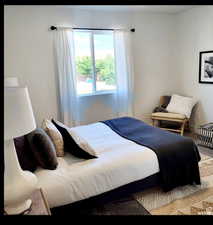 Bedroom featuring carpet floors