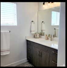 Bathroom with vanity and tile patterned floors