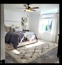 Bedroom with carpet flooring and a ceiling fan
