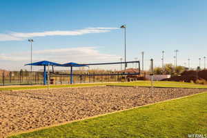 View of community featuring volleyball court