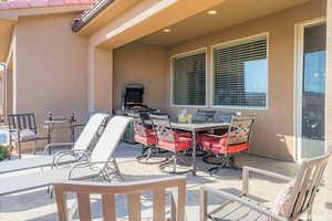 View of patio with outdoor dining space