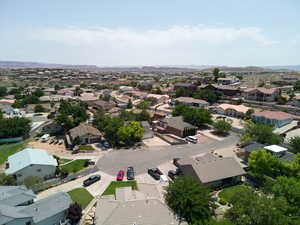 Aerial view of residential area with a mountainous background