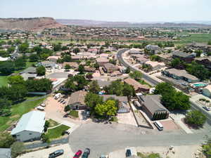 Aerial view of residential area with a mountainous background