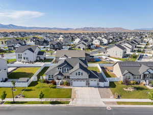 Aerial view of residential area with a mountain backdrop
