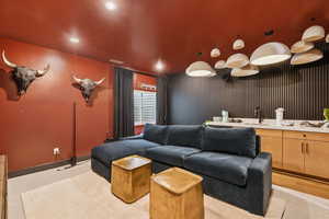 Cinema featuring recessed lighting and a sink