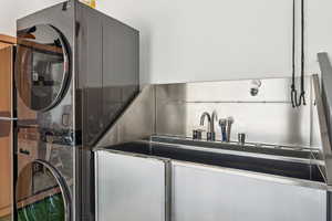 Laundry room with stacked washer / drying machine