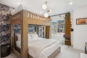 Bedroom with carpet floors and recessed lighting
