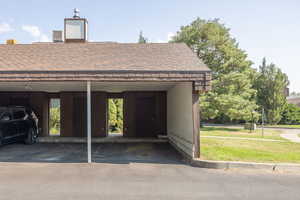 Garage featuring covered parking