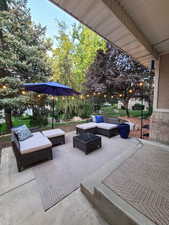 View of patio featuring an outdoor hangout area