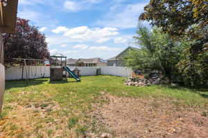 View of yard with a playground