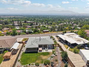 View of subject property featuring mountains