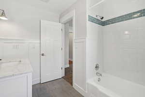 Full bath with shower / bathtub combination and vanity