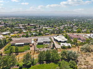 Aerial view of residential area featuring mountains