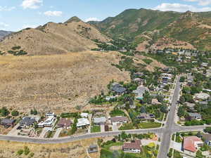 Aerial view of property's location with nearby suburban area