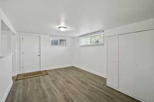 Below grade area featuring wood finished floors