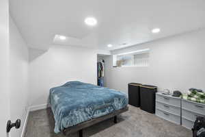 Bedroom with carpet flooring and recessed lighting