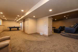 Game room featuring carpet flooring, recessed lighting, and billiards