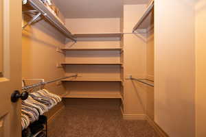 Spacious primary walk-in closet