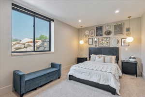 Carpeted bedroom featuring recessed lighting