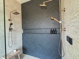 Bathroom with tiled shower