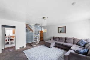 Living area featuring Spiral staircase