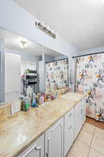 Full bath with vanity