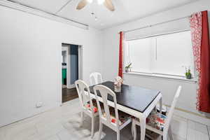 Dining area with ceiling fan
