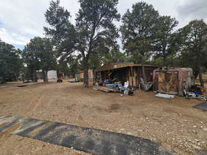 View of yard featuring a storage shed