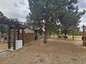 View of yard with a pergola
