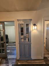 Detailed view of wood finished floors and baseboards