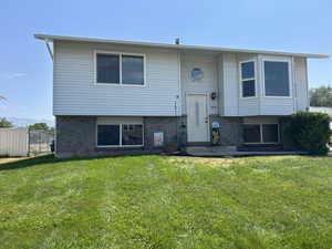Bi-level home with brick siding