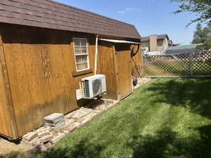 View of yard with an outdoor structure